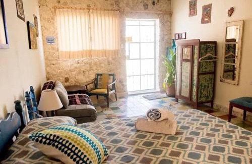 Centro House | Casa Chaak Maya - Estudio privado con alberca en Mérida