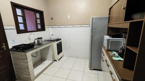 Rio das Ostras House | Casa com Garagem, 3 Quartos e Churrasqueira