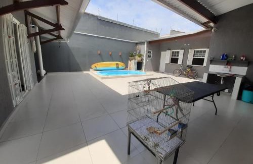 Praia dos Sonhos House | Casa com piscina, confortável e ótima localização