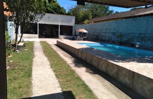 Vista Linda House | Casa com Piscina Privativa em Bertioga 2 Suítes e Wi-Fi Bem próxima à praia