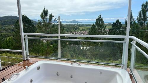 Jardim Capricornio House | Casa com spa em Caraguatatuba