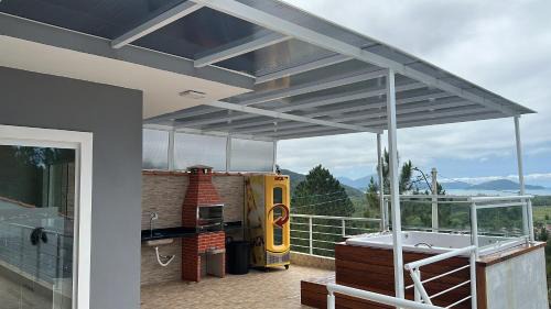 Jardim Capricornio House | Casa com spa em Caraguatatuba