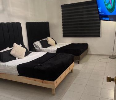 Torreon House | Casa completa y equipada 4 habitaciones 6 camas asador y juguetes para niños A 10 minutos de parques industriales, clínicas 71 y 16 del IMSS y del ISSSTE juegos Arcade
