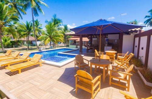 Olivenca Apartment | Casa completo com grande piscina sob coqueiros, pe na areia