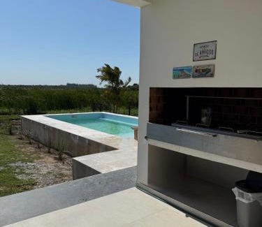 Corrientes House | Casa con Piscina sobre Laguna Brava - Tranquilidad y Naturaleza en Barrio Privado
