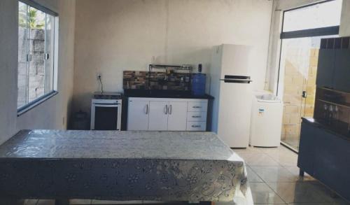 Caravelas House | Casa da Cris em Praia do Grauçá com Wi-Fi, ar condicionado e garagem