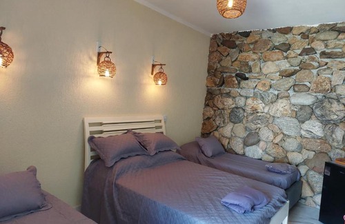 Jardim Aruan House | Casa das Pedras