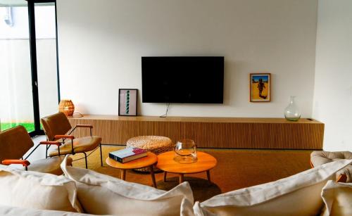 Jardim Acapulco House | Casa de Cinema no Guarujá - Condomínio Acapulco