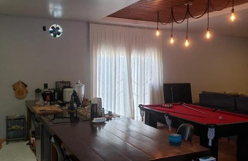 Canasvieiras House | Casa de praia com piscina aquecida área gourmet e jogos