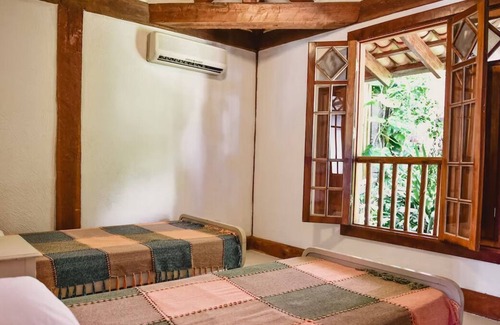 Ilhabela House | Casa de Praia em Condomínio Fechado com Churrasqueira e Piscina à Beira mar