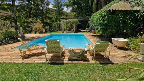 Itatiba Villa | Casa de Vidro na Mata há 90km de São Paulo, com Lago, Piscina, Caiaque, Stand UP, Cascata e Escorrega no Lago - Quinta do Vale Itatiba