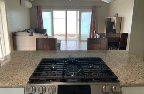 Tar Bay Apartment | Casa Del Marjorie 2 bedroom beach house, beach right at your door steps,