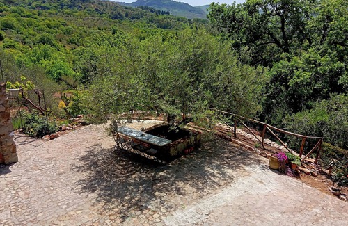 Madonie National Park House | Casa del Vento in San Cono, ancient stone dwelling among olive trees