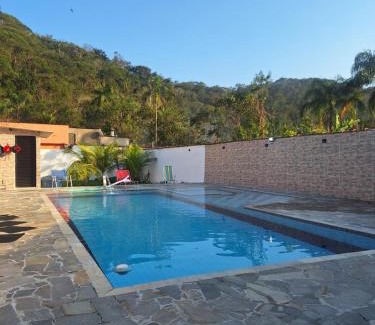 Caiubura House | Casa em Bertioga com piscina aquecida
