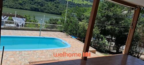 South Region House | Casa em Chapeco com Piscina e Vista da Montanha