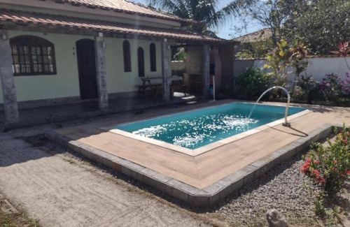 Jacone House | Casa em poucos passos da praia de Jaconé