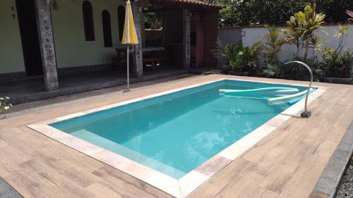 Jacone House | Casa em poucos passos da praia de Jaconé