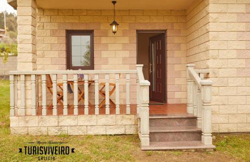 Faro House | Casa en la playa de Area con finca privada