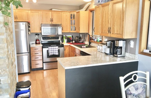 Vernon Ski Chalet | Casa Familia has stunning lake views, with heated pool+ hot tub minutes to beach
