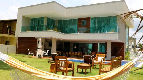 Parafuso House | Casa Frente Mar 5 Suítes Guarajuba em Condomínio