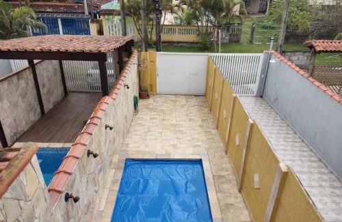 Tupy House | Casa inteira ITANHAÉM Piscina AQUECIDA, Churrasqueira e Wi-fi