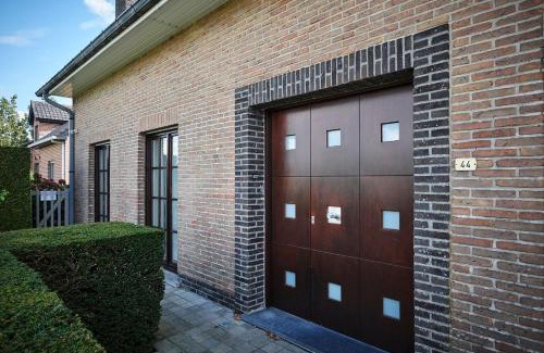 Vleteren House | Casa Jacaranda