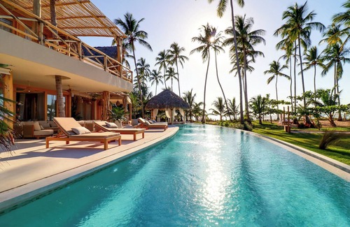 Puerto Bahia Villa | Casa La rodonda: 9 bedroom beachfront on spectacular sunset location.