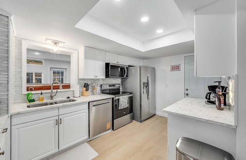 Hampton Homes House | Casa Las Olas - Waterfront Home with Heated Pool, Movie Theater & Arcade