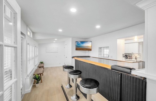 Hampton Homes House | Casa Las Olas - Waterfront Home with Heated Pool, Movie Theater & Arcade