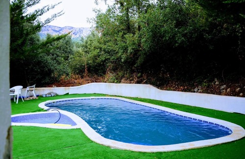 Majada Carrasca Cottage | Casa Los Gatos 1 to 13 people. 4 bedrooms with bathroom, living room with fireplace, heating.