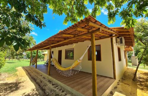 Caravelas House | Casa Marfim - Privacidade, charme e conforto à 50m do rio