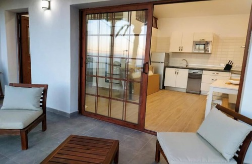 Alojera House | Casa Mercedes: sunset with panoramic views of the sea and the mountains.