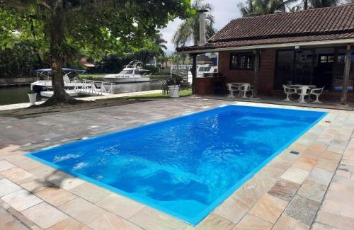 Marina House | Casa na Marina com piscina churrasqueira e píer