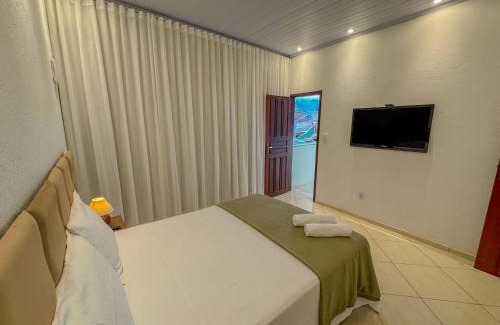 Mambucaba House | Casa na prainha de Mambucaba. Uma quadra do mar.