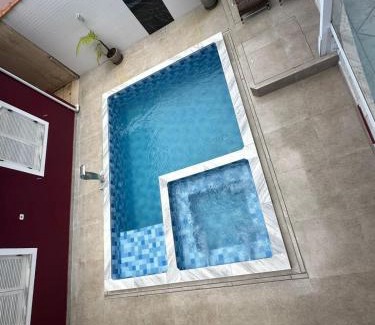 Centro House | Casa no Centro de Bertioga com Piscina