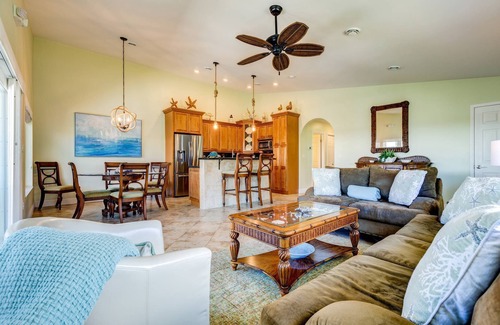 Coury House | Casa Paraiso: Discover This Charming 2BR Canal Front Duplex in KCB with Private Pool & Dockage!