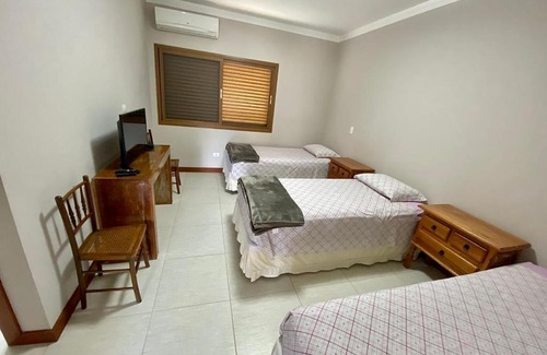 Guaeca House | Casa particular na praia de Guaecá