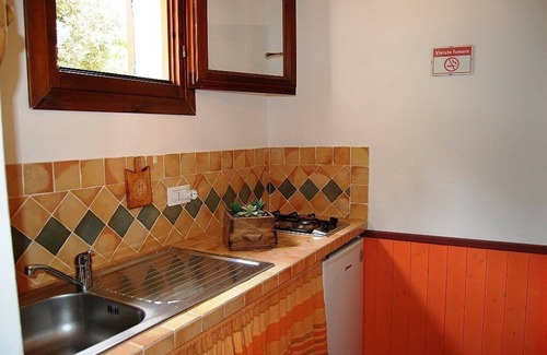 Loiri Porto San Paolo House | Casa Perella F: A graceful cottage surrounded by the greenery, with Free WI-FI.
