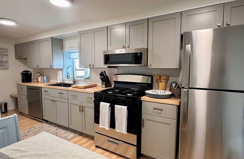 Oscoda House | Casa Playa - Lakefront Escape with Private Sugar Sand Beach, Game Room, Sleep 8
