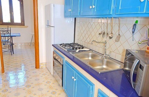 Marina San Gregorio House | Casa Ria A: A welcoming two-story apartment that is part of a villa situated at a short distance from the beach, with Free WI-FI.
