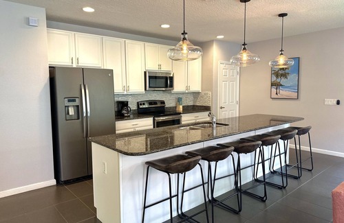 Buena Ventura Lakes House | Casabella Lake Nona Pool Home with 2 Primary Suites