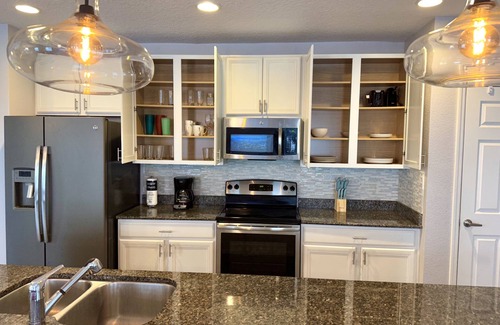 Buena Ventura Lakes House | Casabella Lake Nona Pool Home with 2 Primary Suites