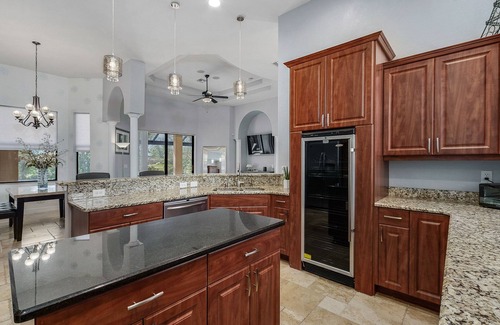 Trafalgar House | Casita Cabo Coral on Gulf Access Canal with Heated Salt Pool & Spa