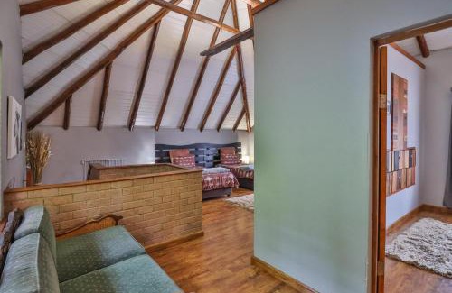 Assagay Ski Chalet | CASTLE COTTAGE Self catering fully equipped homely 120sqm double story king bed cottage in a lush green neighborhood