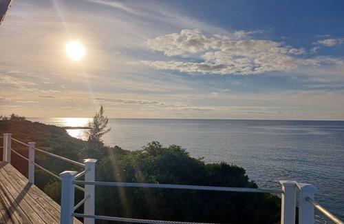 Port Howe House | Cat Island Paradise . Overlooking turquoise waters and sky, sunrise and sunset.
