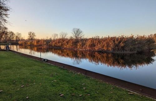 Pinconning House | Catch on the Canal - Waterfront Getaway Near Casino, Dining & Entertainment