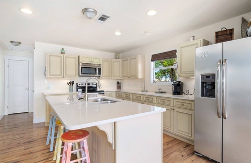 Palm Harbor House | Catch & Play on Estes Bay | Pet-friendly + Canal-front