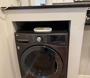Joslyn Castle Apartment | Cathedral Modern King bed with Washer & Dryer