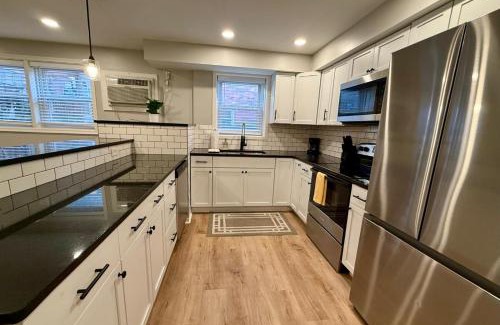 Joslyn Castle Apartment | Cathedral Modern King bed with Washer & Dryer