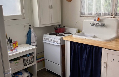 Seneca Falls Cottage | Cayuga Lake Charming Vintage Cottage on the Water with Private Dock